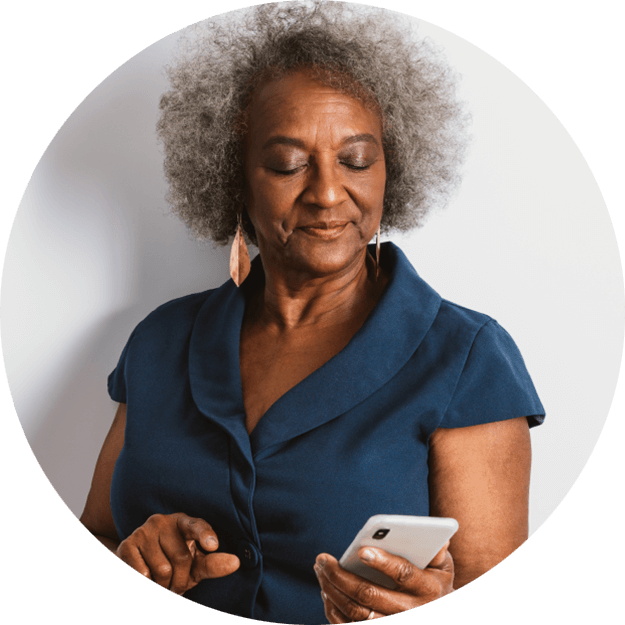 Older woman holding smart phone