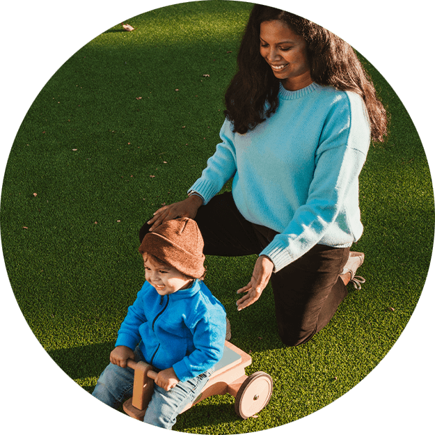 woman and child playing outside