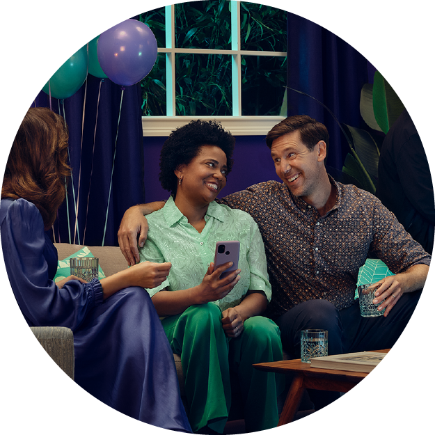 man and woman looking at each other sitting on couch